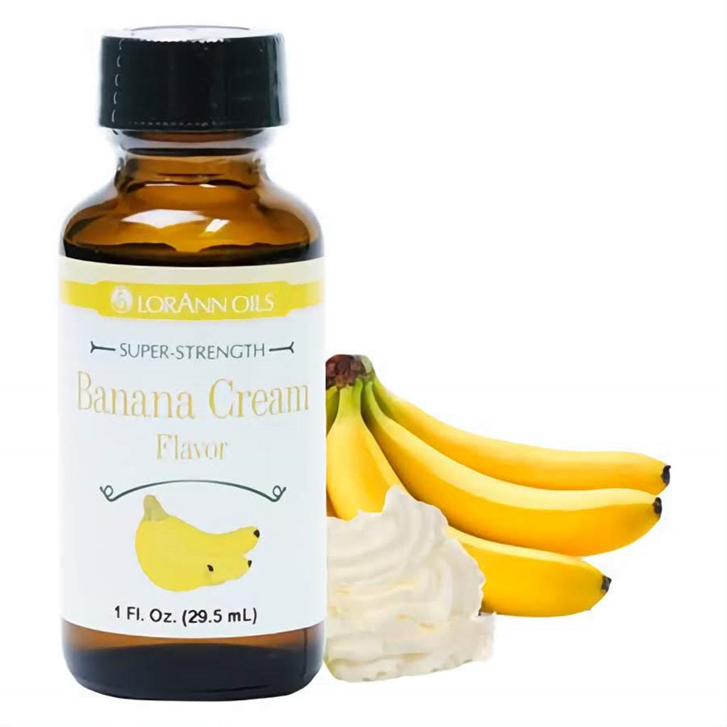 LorAnn Oils Super Strength Banana Cream Flavor, 1 fl oz bottle, accompanied by a bunch of yellow bananas and a dollop of cream, suggestive of the flavor profile.