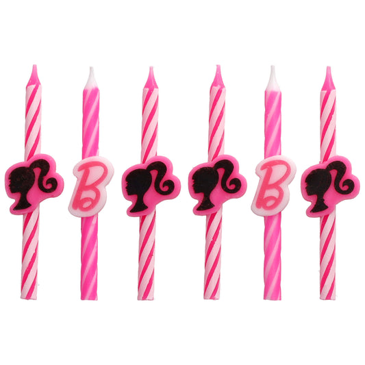 Six Barbie birthday candles arranged in a row, featuring pink and white stripes with alternating black Barbie silhouette and pink “B” decorations.