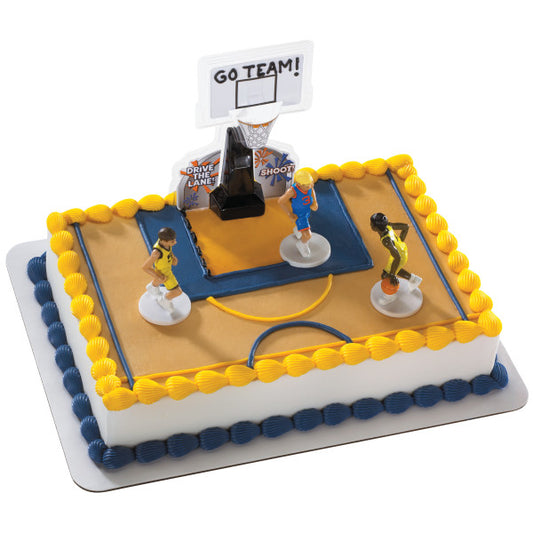 Rectangular basketball-themed birthday cake topped with DecoSet figurines and a hoop backboard decoration.