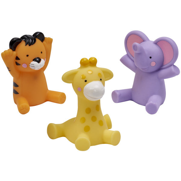 Three colorful animal figurines, including a tiger, giraffe, and elephant, sitting upright with playful expressions.