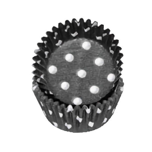 Black mini cupcake liner with white polka dots, stacked for display

