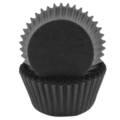 Standard-sized black greaseproof cupcake liners, stacked in a nesting arrangement. These liners are designed to prevent grease from soaking through, ensuring a clean and professional presentation for cupcakes.