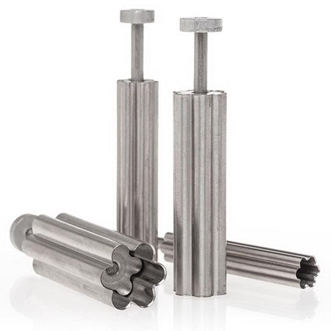 Set of four stainless steel flower-shaped plunger cutters standing upright, showcasing different sizes.