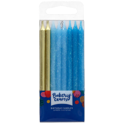 Clear retail package of Bakery Crafts birthday candles showing metallic gold candles and assorted light blue and dark blue glitter candles with a blue label.