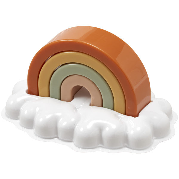 A five-piece cake topper featuring a stackable rainbow in earthy tones sitting on a white cloud base.