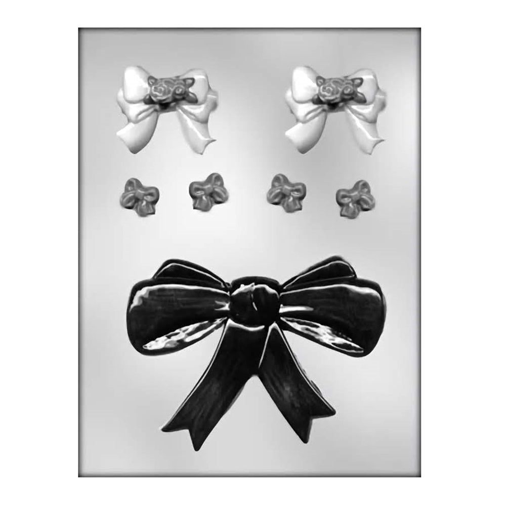 A decorative chocolate mold including three sizes of ribbon bows with intricate knot and draping details, ideal for creating edible decorations for gift-themed cakes, cupcake toppers, or celebration favors.