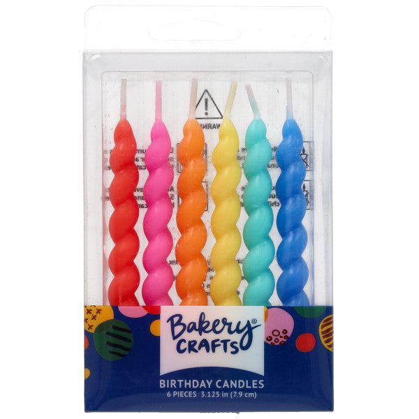Bakery Crafts birthday candle pack with six thick spiral twist candles in bright red, pink, orange, yellow, green, and blue inside a clear plastic box.