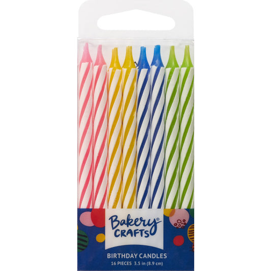 Pack of 16 tall spiral birthday candles in bright pink, yellow, blue, and green, displayed in a clear package labeled "Bakery Crafts."