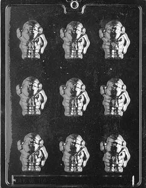 Clear plastic mold featuring small Santa head cavities, approx. 2 by 1 1/2 by 3/8 inch; C003