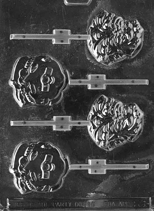 Clear mold featuring two portrait-style heads of Santa and Mrs. Claus; round cheeks, textured beard and bonnet; shallow 1/4 in. depth; C031