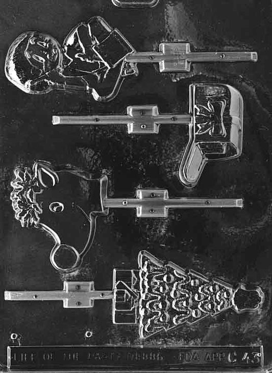 Clear assortment mold including a drummer motif; shallow 1/4 in depth; largest approx. 2 7/8 × 3 3/8 in; C043