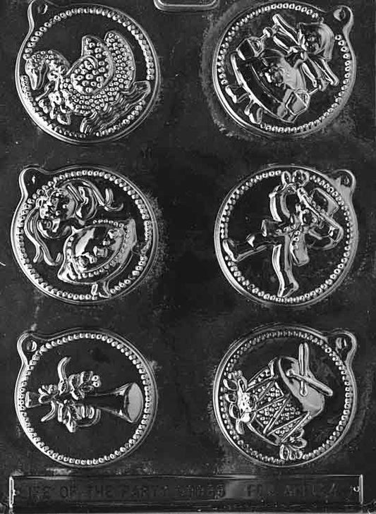 Clear mold with six round lollipop medallions completing the “12 Days” theme; crisp raised designs; 2.5 in diameter, 1/2 in deep; C049