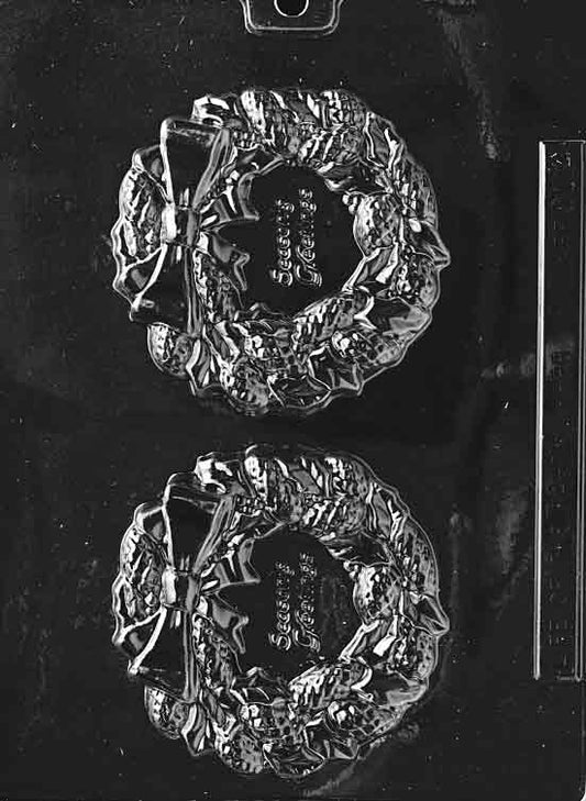 Image of SEASONS GREETINGS WREATH mold with large circular wreath, bow, and raised holiday greeting text