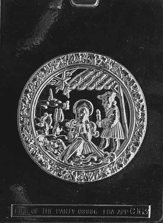 Image of NATIVITY PLAQUE mold showing circular design with detailed holy family scene inside stable