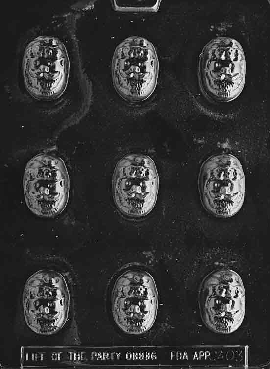 Small chocolate mold with smiling Santa face for bon bons