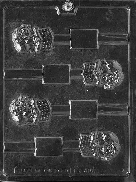 Chocolate mold shaped like Santa face designed to hold pretzel sticks