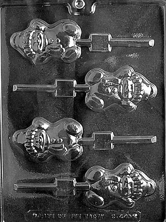 Lollipop mold shaped like a smiling snowman