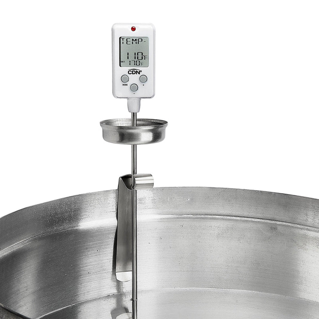 CDN DTC450 Digital Candy Thermometer clipped to a metal kettle with its long stem extending into the pan