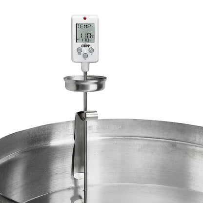 CDN DTC450 Digital Candy Thermometer clipped to a metal kettle with its long stem extending into the pan