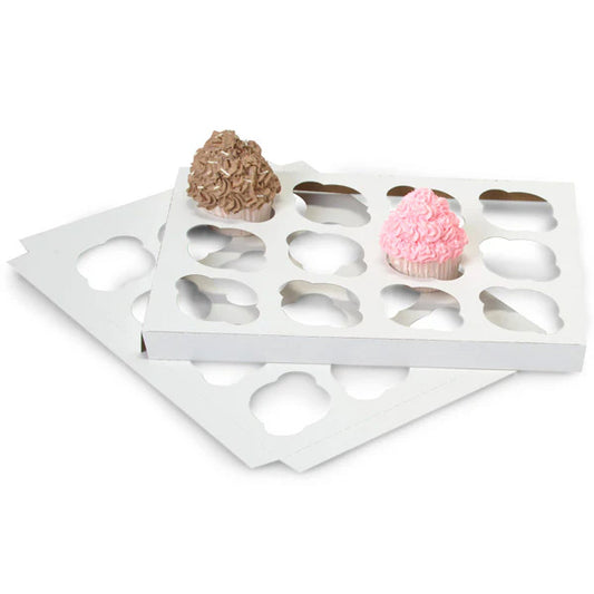 Stacked white cupcake box inserts with multiple cutout holes for cupcakes, shown with two frosted cupcakes on top on a white background.