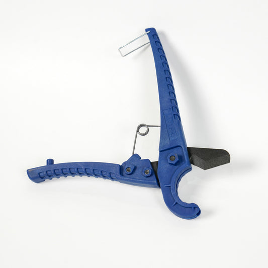 Cake Dowel Cutter in blue, open position showing sharp steel blade and spring mechanism.