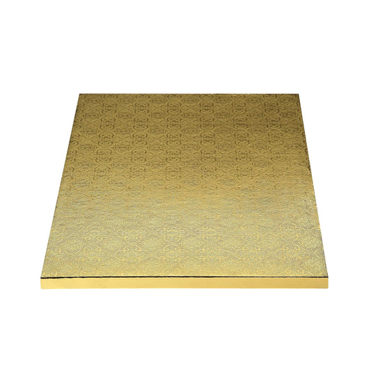 Gold half sheet cake drum board with an embossed decorative pattern and foil-wrapped edges, photographed flat on a white background.