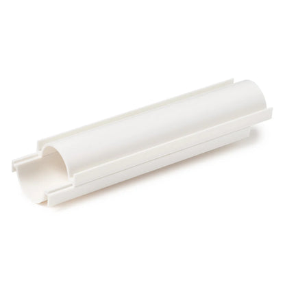 White two-piece cake pop roller shown assembled at an angle, featuring a long rounded channel with raised side rails on a white background.