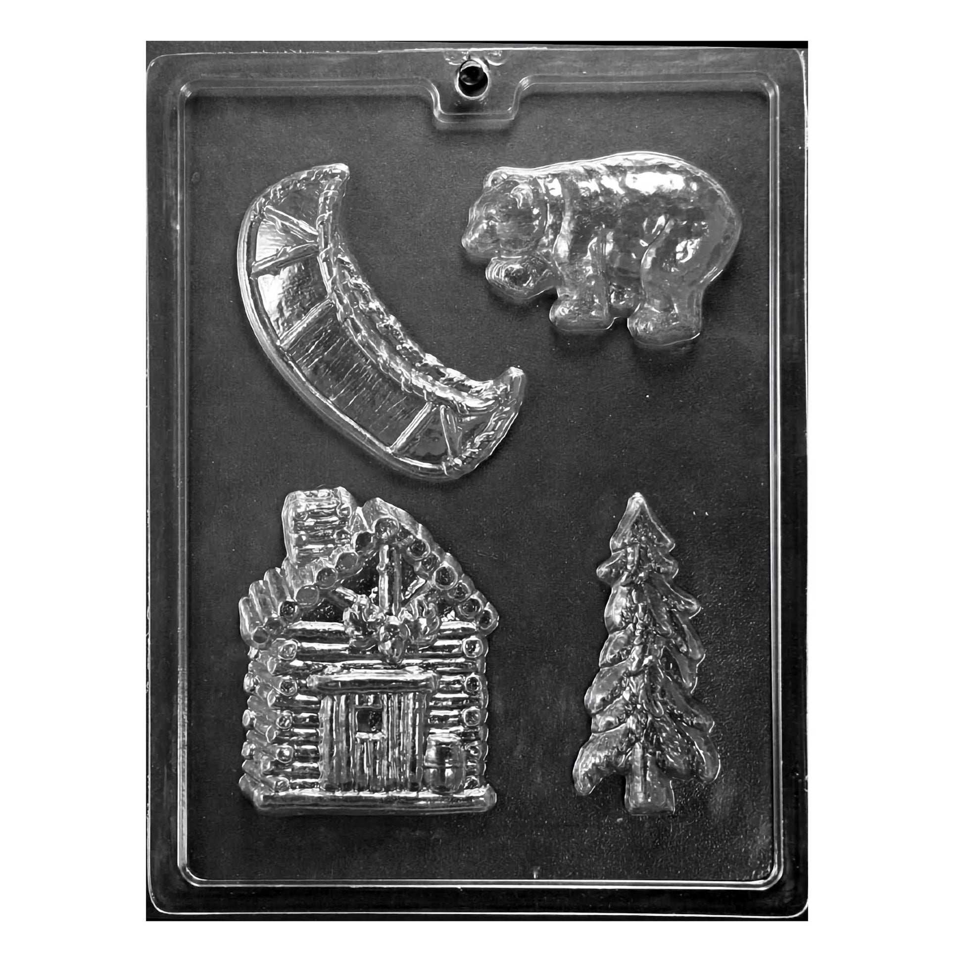 A detailed chocolate mold set themed around camping, featuring a crescent moon, a bear, a cabin, and a pine tree. The designs are deeply embossed for a realistic appearance, ideal for creating themed chocolates for camping enthusiasts or outdoor-related events.