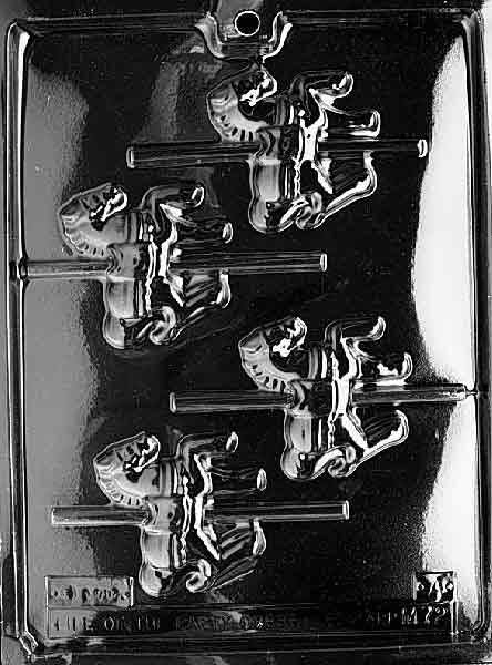 Clear plastic mold tray with four carousel horse lollipop cavities on horizontal poles, showing saddle and mane details.