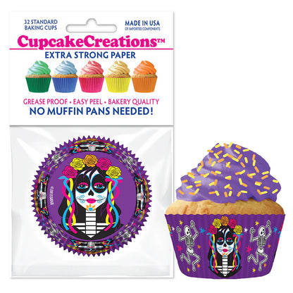 Colorful Dia de los Muertos themed cupcake baking cups by Cupcake Creations featuring Catrina designs and festive skeletons.