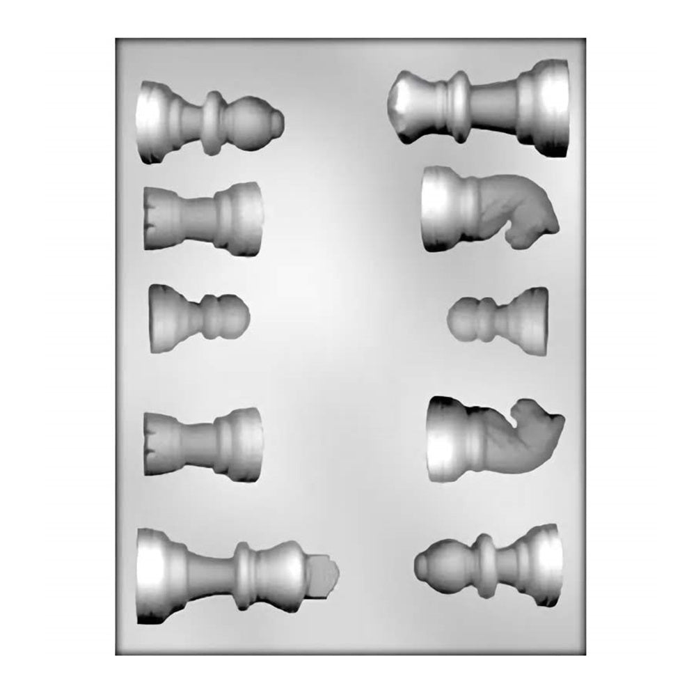 The image displays a chocolate mold with eight cavities, each shaped like different chess pieces including pawns and knights. The mold captures the classic contours and details of the chess pieces, such as the distinctive horsehead of the knight and the rounded head of the pawn.