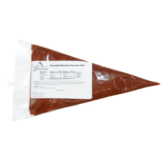 Chocolate Hazelnut Truffle Filling Squeeze-Ums in an 8 oz bag, pre-made soft cream filling for truffles and chocolates.