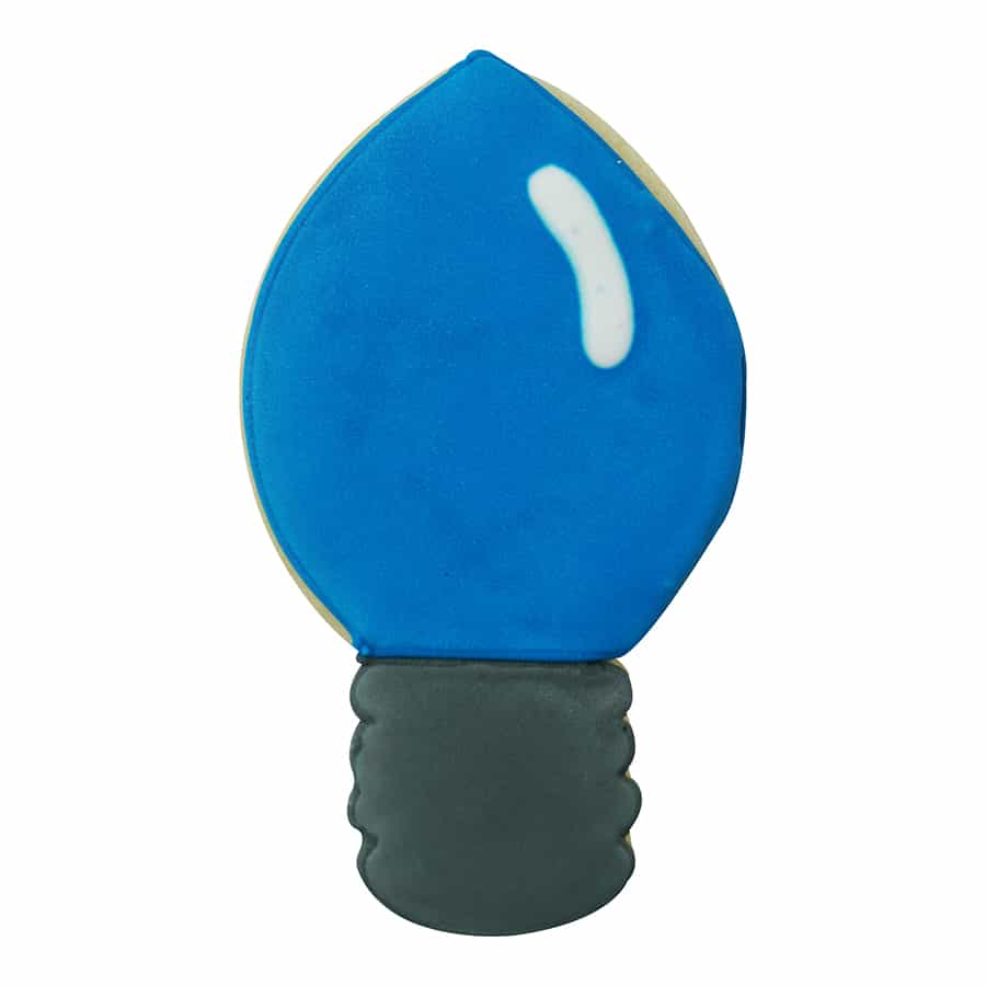 Bright blue Christmas lightbulb cookie with a glossy finish and a dark base, resembling a classic holiday decoration.