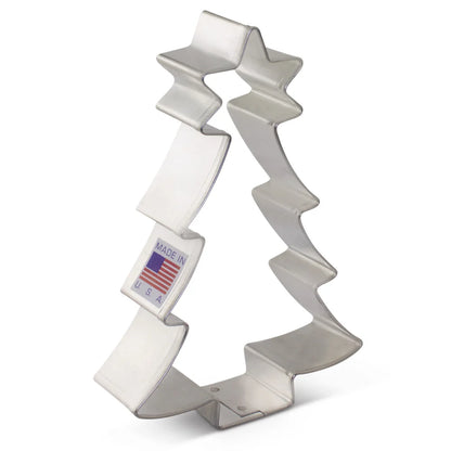 Metal Christmas tree-shaped cookie cutter with a star on top, featuring a "Made in USA" sticker.