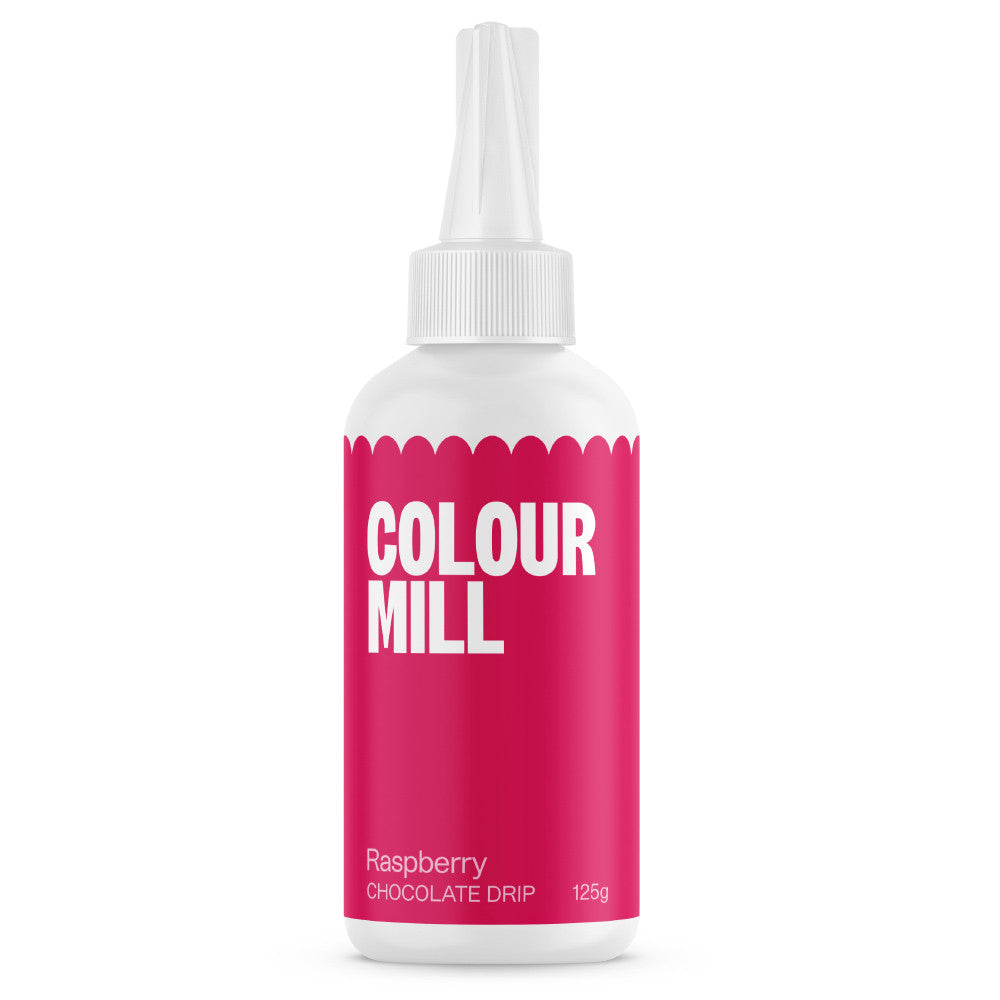 Colour Mill Raspberry Cake Drip in a 125 g white squeeze bottle with a pointed nozzle and vivid raspberry-pink label on a white background.
