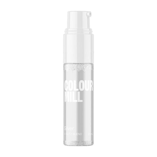 Colour Mill Silver Edible Glitter Glitz Blend in a slim 25 mL pump bottle with a white dispenser, silver label, and reflective silver glitter visible inside.