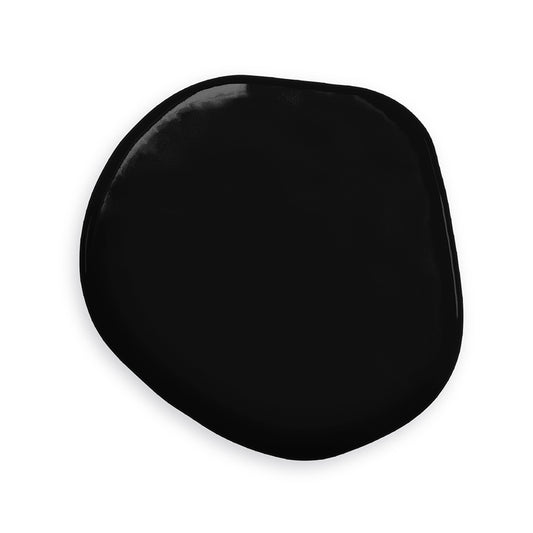 Swatch of Colour Mill Black Oil Blend food coloring showing a rich, deep black tone with a smooth finish