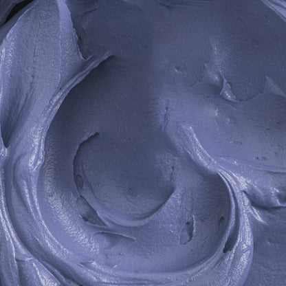 Close-up of buttercream tinted with Colour Mill Denim, showing its smooth, rich blue hue.