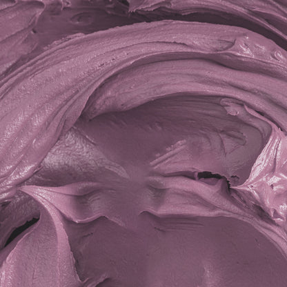 Close-up of buttercream colored with Colour Mill Mauve, showcasing its rich and smooth purple-pink tone.