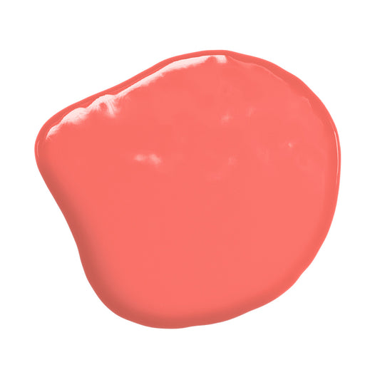 Swatch of Colour Mill Coral oil-based food coloring in a vibrant pink-orange hue.