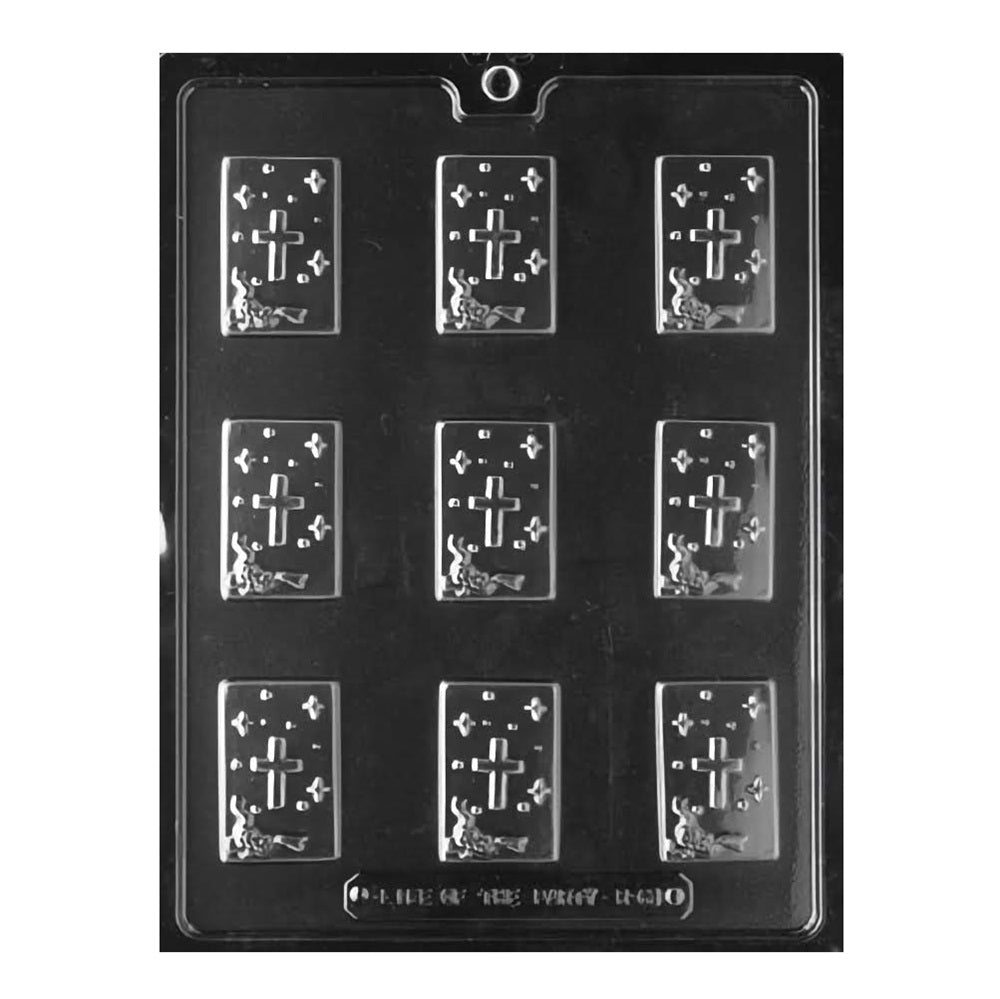 This chocolate mold displays an array of religious symbols including crosses, bibles, and chalices, perfect for creating meaningful treats for First Communion, Baptism, or other Christian religious ceremonies.