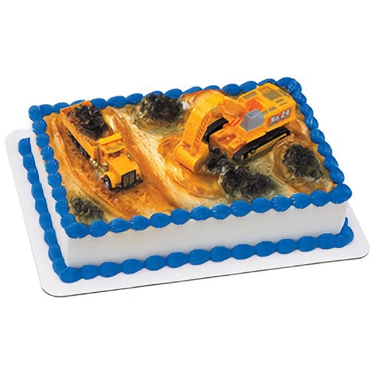 Detailed cake topper set featuring bright yellow miniature construction vehicles including a excavator and a dump truck for a birthday cake.