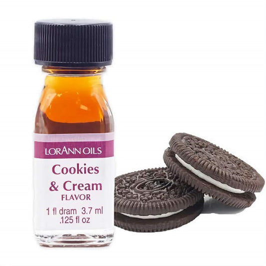 One-dram bottle of LorAnn Oils Cookies & Cream Flavor beside two chocolate sandwich cookies with white cream filling.