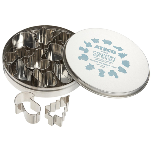 Ateco 4850 12-piece stainless steel country-themed cutter set with various shapes, displayed in a round metal storage tin with a labeled lid.