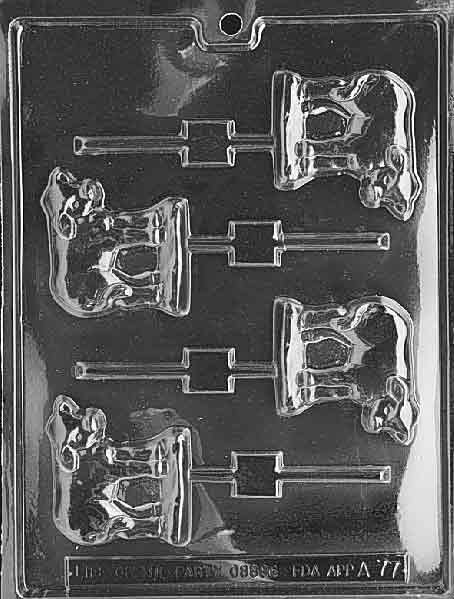 Plastic candy mold with four lollipop cavities shaped like cows, featuring detailed faces and legs, designed for making large chocolate or candy pops.