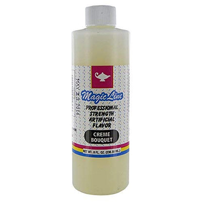 Tall 8 fl. oz bottle of Magic Line Creme Bouquet artificial flavor, showing a white label with a red teapot logo and colorful bottom stripes.