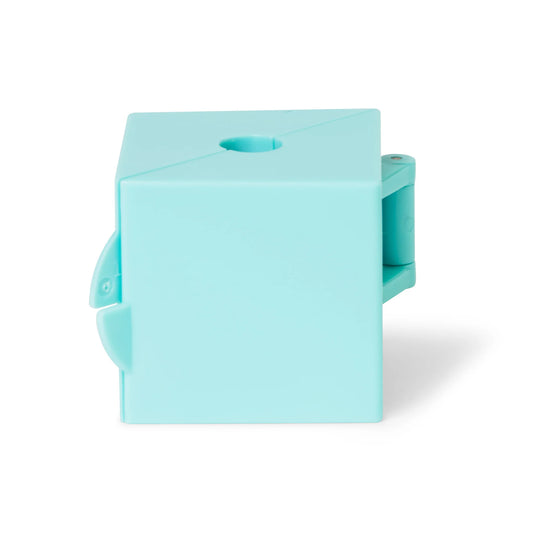 Aqua blue cube-shaped cake pop mold with smooth edges and visible air hole at the top, designed for shaping square cake pops.