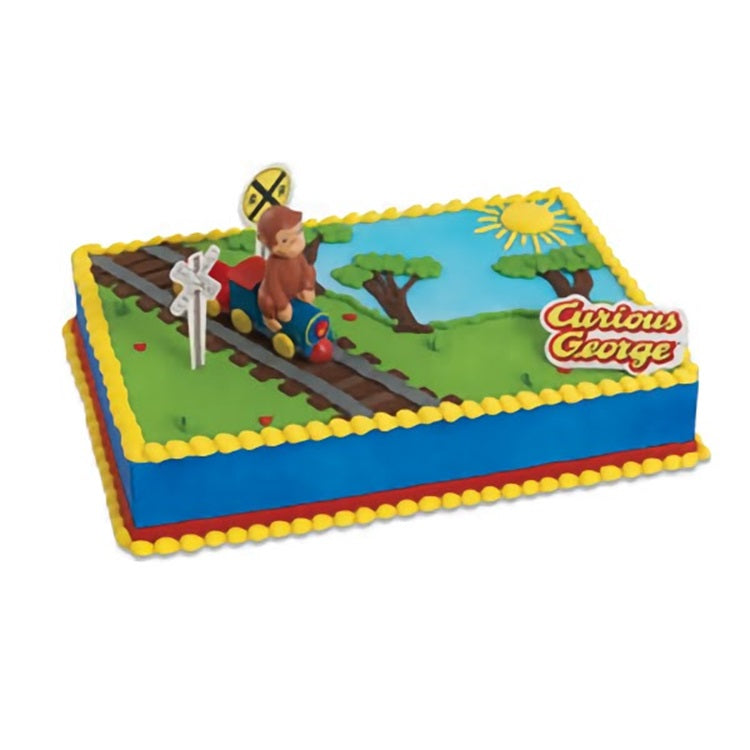 A celebratory cake featuring 'Curious George' riding a train on a track, with vibrant green grass and a clear blue sky, capturing the playful spirit of the beloved character.