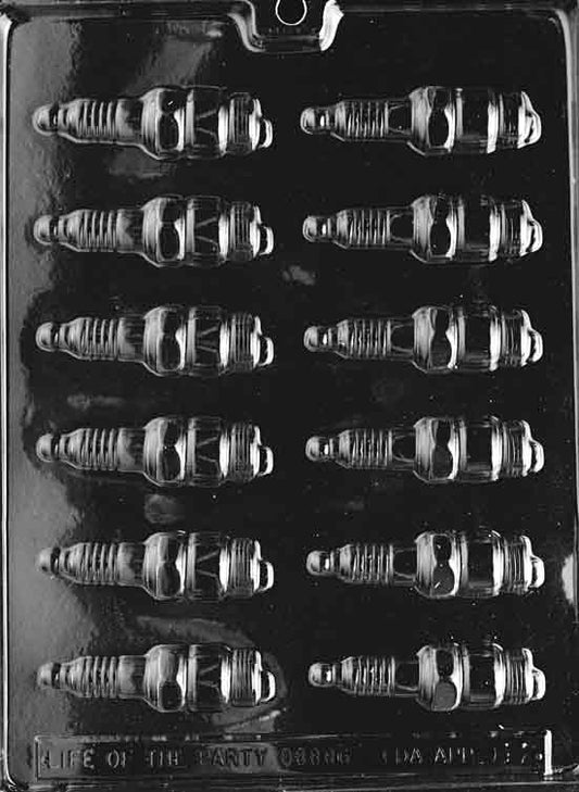 Tiny chocolate mold shaped like spark plugs