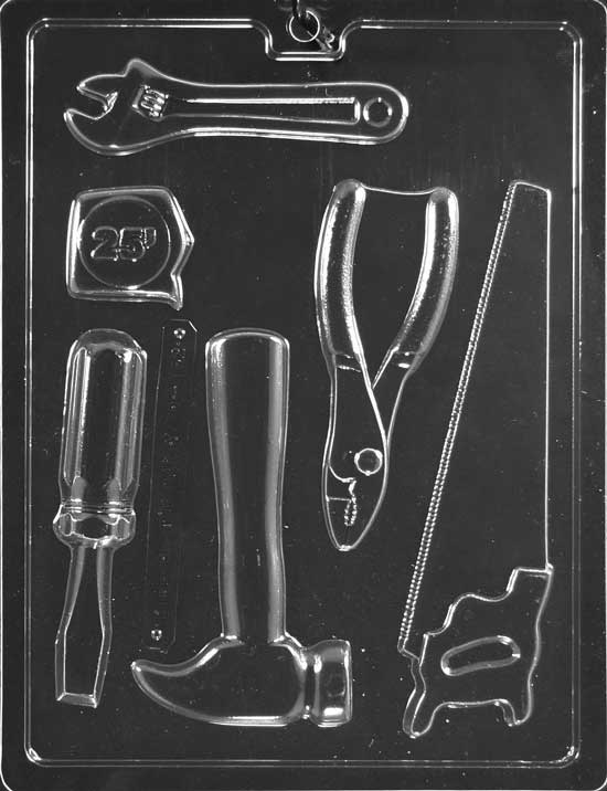 Various chocolate tools including wrench and hammer